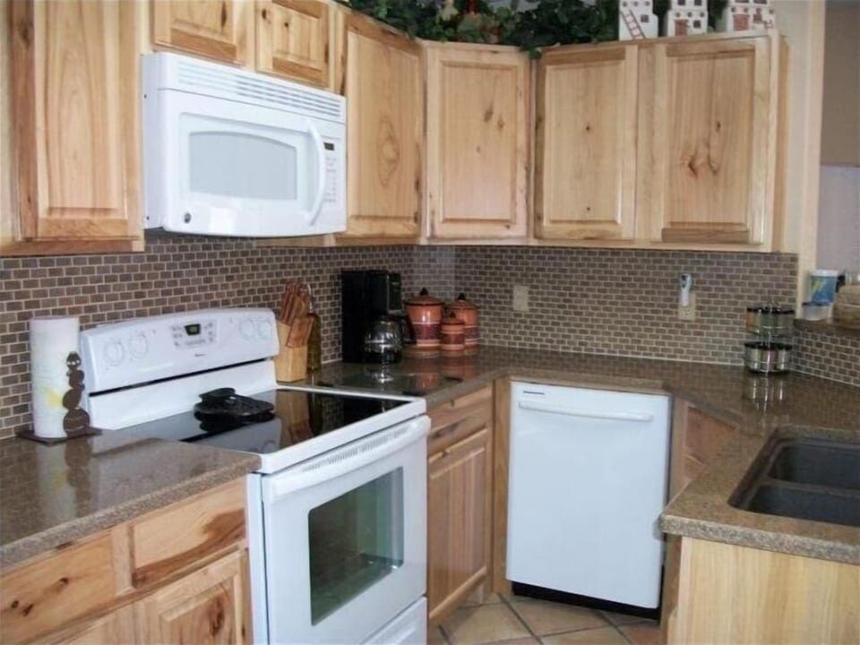 Kitchen with Range Oven, Microwave and Dishwasher 