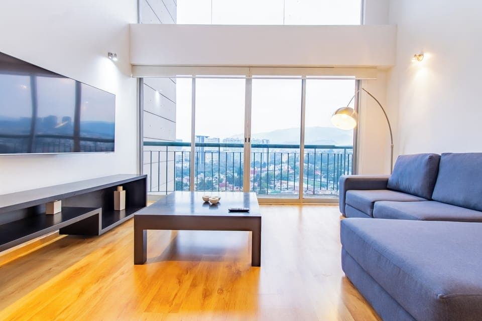 Ready-to-enjoy living area with TV.


