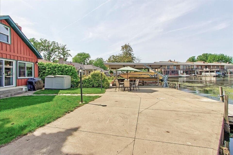 Patio picture from different angle. Note: Boat and Kayaks are not included.