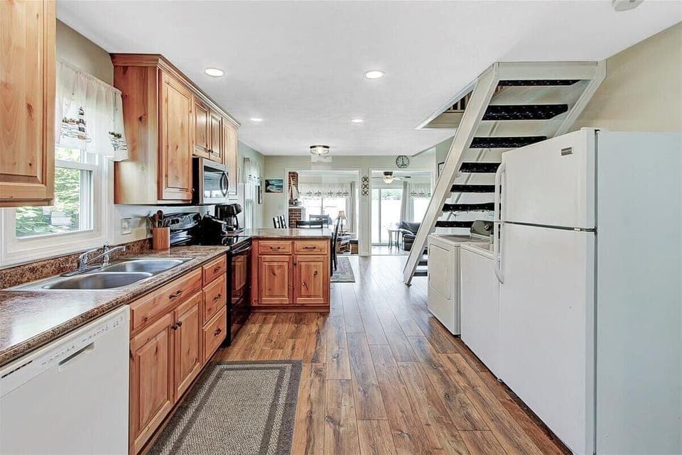 Looking at the kitchen and upstairs steps