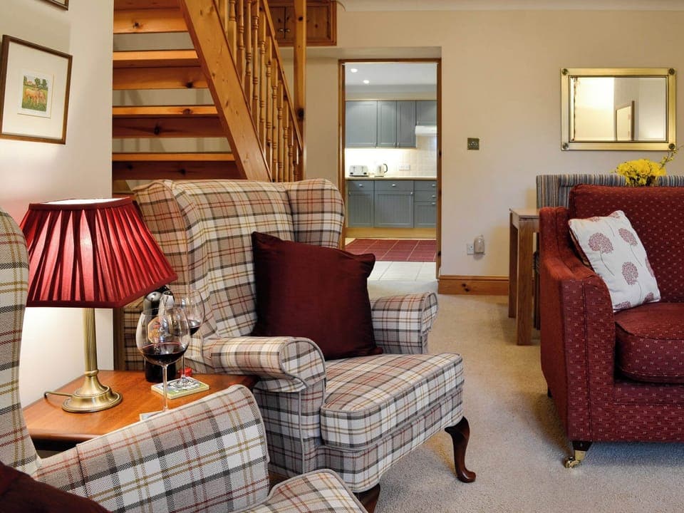 Living room with wood burner | Rose Cottage, Betws-y-Coed