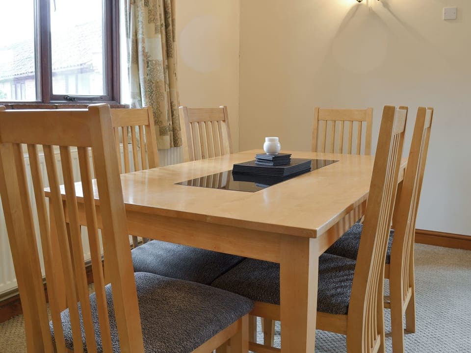 Convenient dining area | Dairy Cottage - Moor Farm Stable Cottages, Foxley, near Fakenham