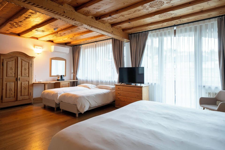 Family Room, Multiple Beds | Minibar, in-room safe, free cribs/infant beds, free WiFi