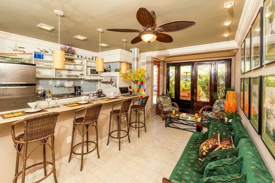 【Family room area】siding to the fully stocked + equipped kitchen!