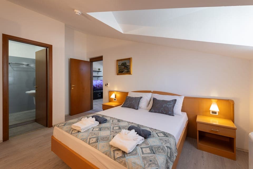 Royal Room | Down comforters, pillowtop beds, individually decorated