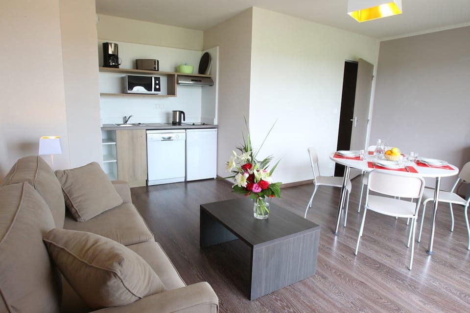 Sink into the cozy sofa after a day exploring the area.