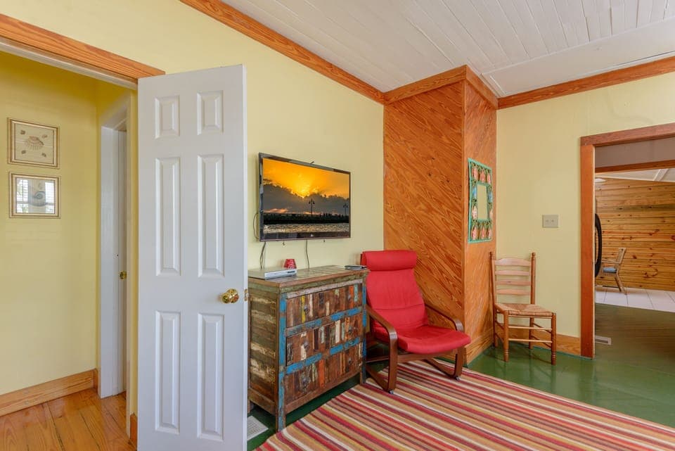 Two Bedroom Poolside Villa | Living room | 36-inch flat-screen TV with cable channels, TV