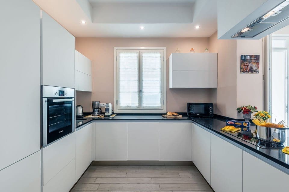 Countertop, Room, Property, Kitchen, Cabinetry, Furniture, Interior Design, Building, Ceiling, Yellow