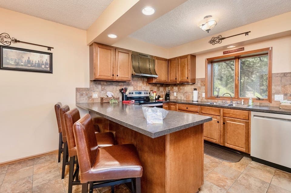 Room, Indoors, Kitchen Island, Flooring, Chair