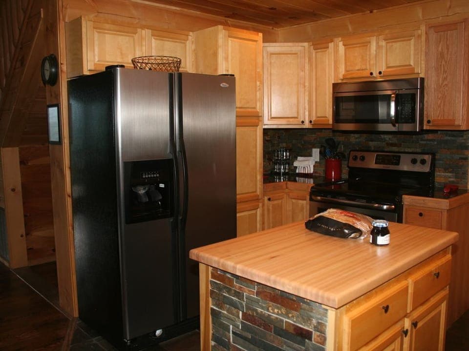 Full kitchen with all cooking supplies provided.  Brand new Dishwasher as well.