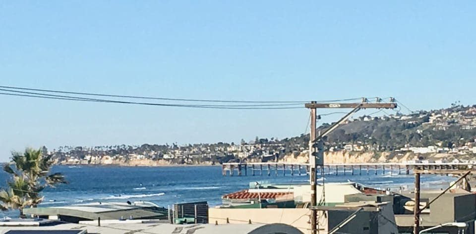 Views up the beach to the north from the walkway to the condo