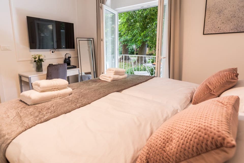 Premium bedding, memory foam beds, in-room safe, desk