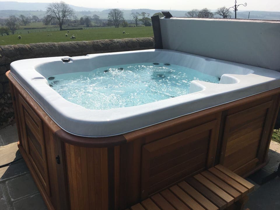 Enjoy a relaxing soak in the hot tub 