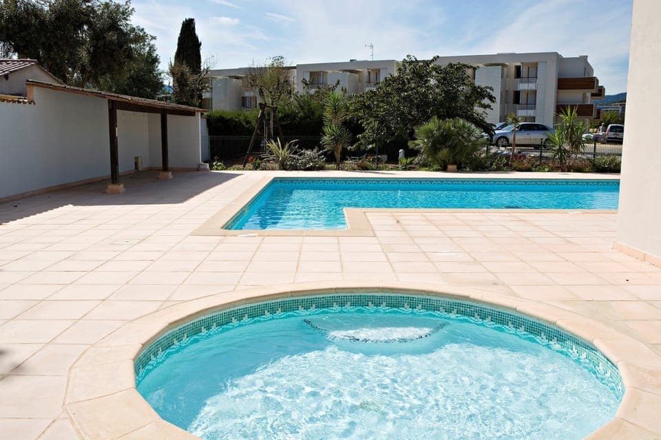 Lounge by the pool in the sunshine.