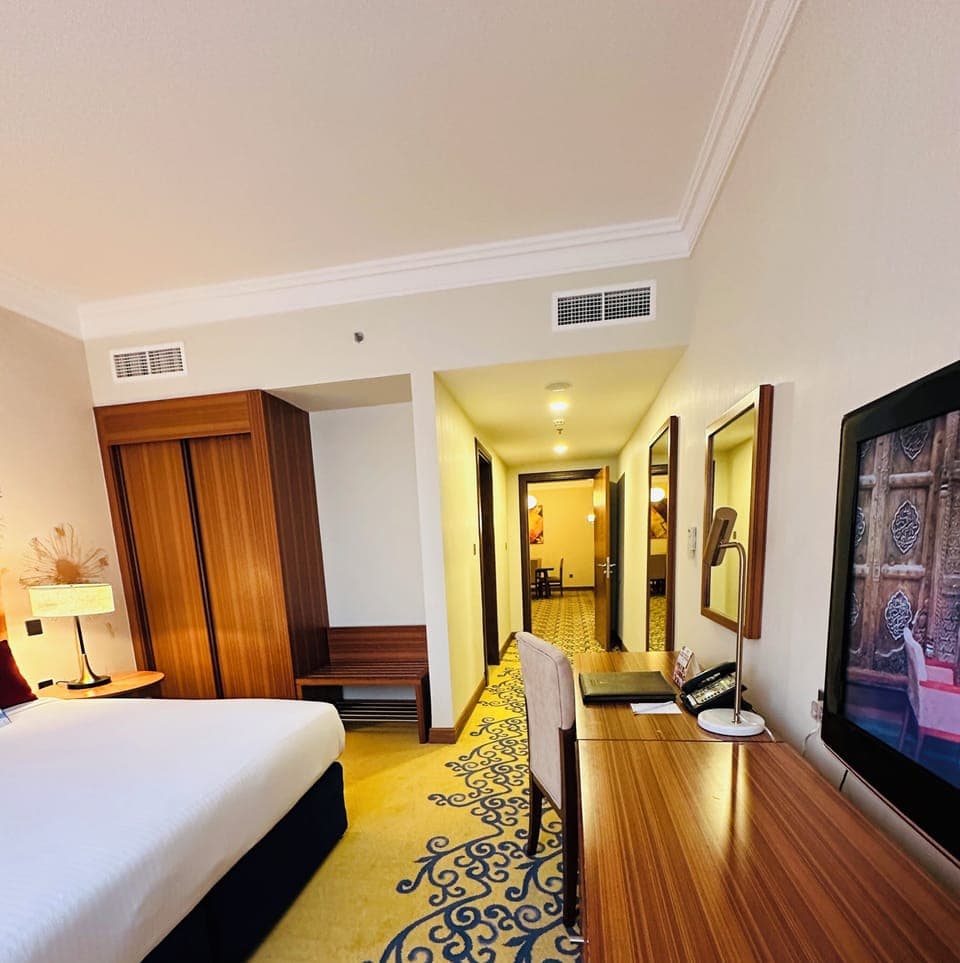 Deluxe Family Suite | Premium bedding, minibar, in-room safe, desk