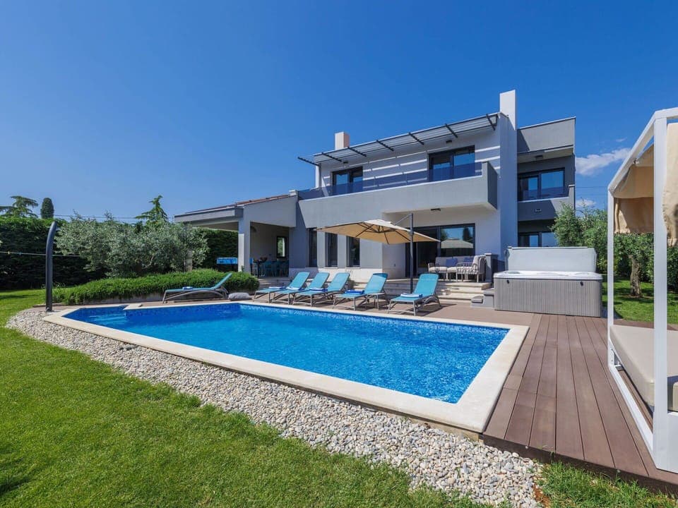 Sky, Plant, Swimming Pool, Building, Water, Window, Shade, Rectangle, Grass, Urban Design