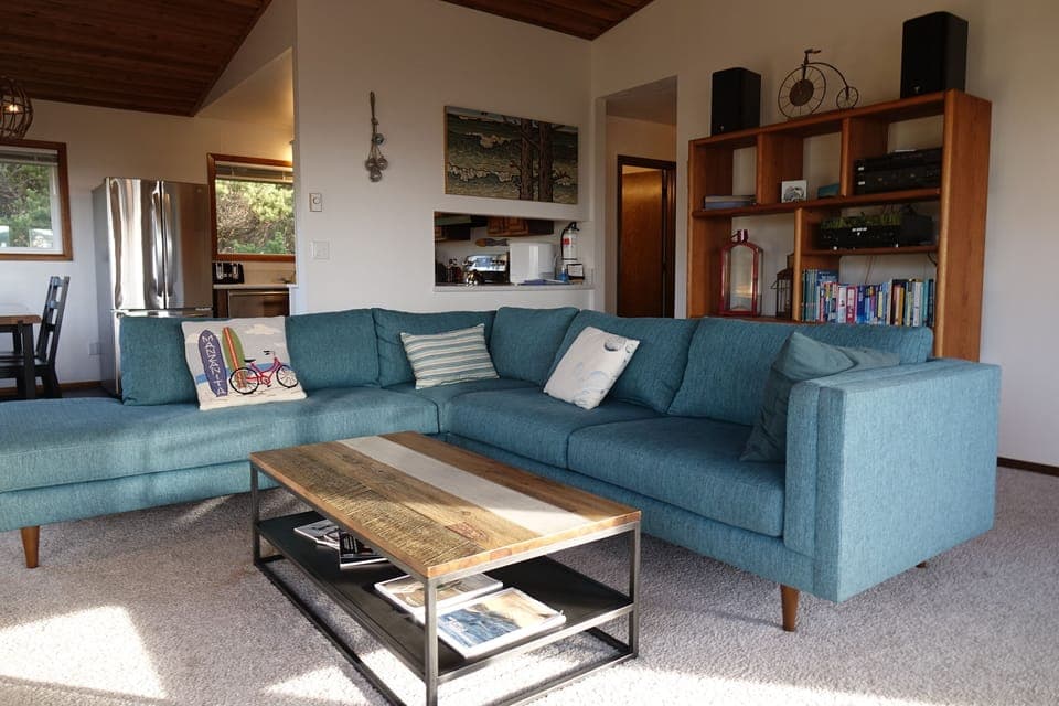 Upstairs living room is a perfect hang out spot with views of the ocean.