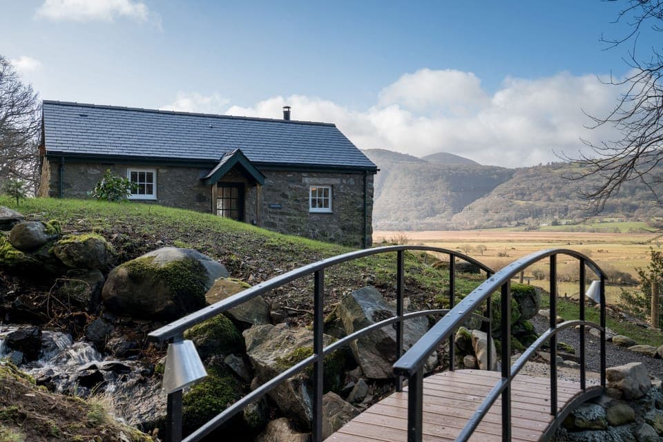 The little bridge walkway over the stream to the cottage