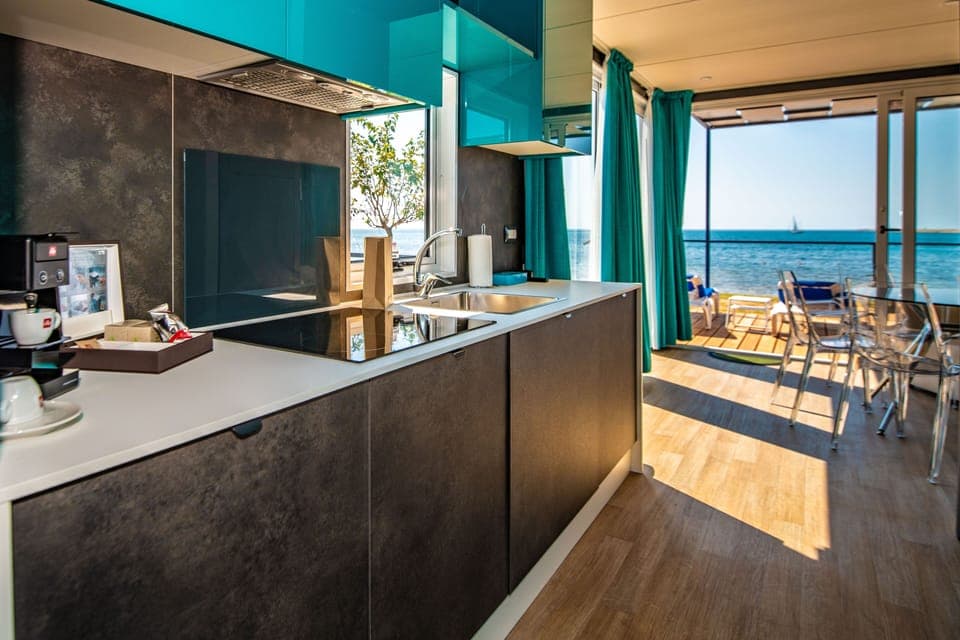 Camping villa first row to the sea | Private kitchenette | Full-size fridge, microwave, stovetop, coffee/tea maker