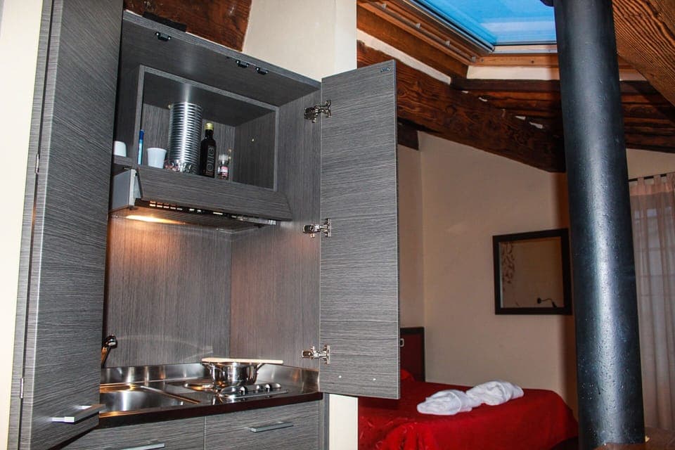 Classic Quadruple Room, Non Smoking | Private kitchenette | Fridge