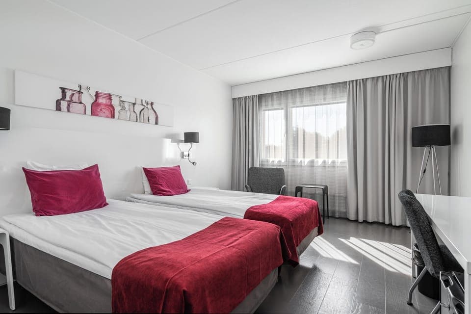 Superior Twin Room | Desk, laptop workspace, blackout drapes, iron/ironing board