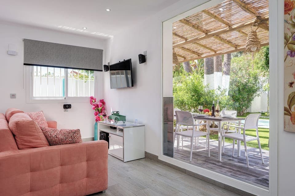 Exclusive Villa, 2 Bedrooms (Villa El Ranchito By Seric) | Living area | 50-inch flat-screen TV with cable channels, TV