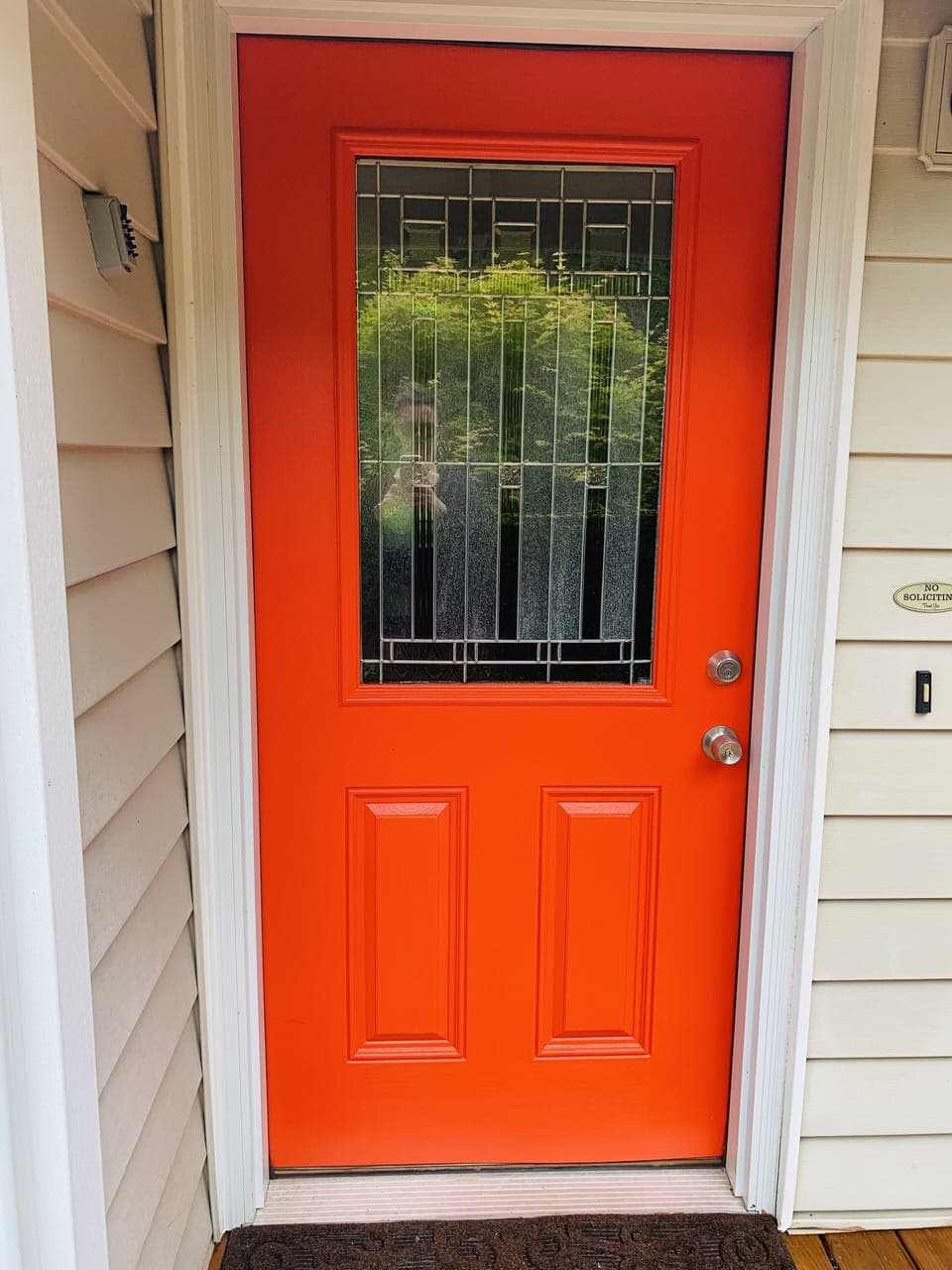 Front door equipped with smart lock for easy check-in and access.