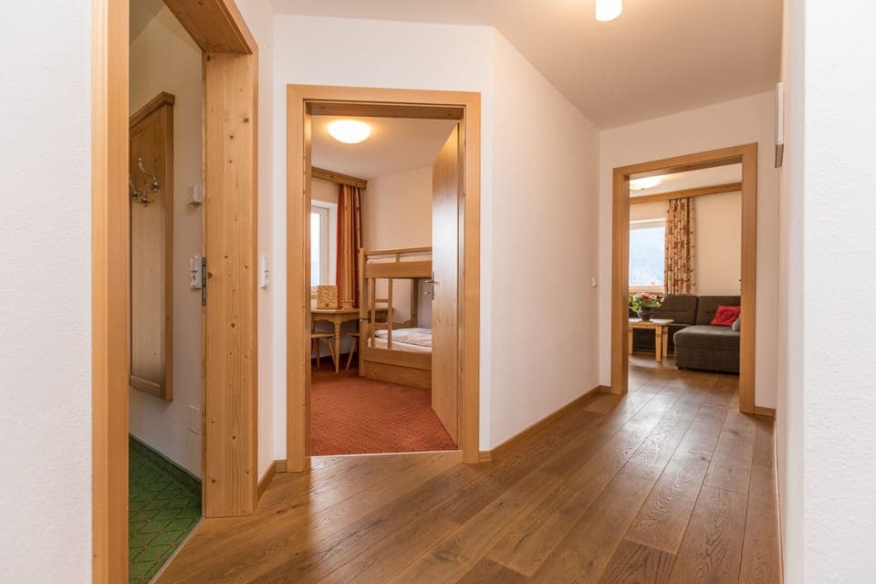 Deluxe Family Apartment | Living area | Heated floors