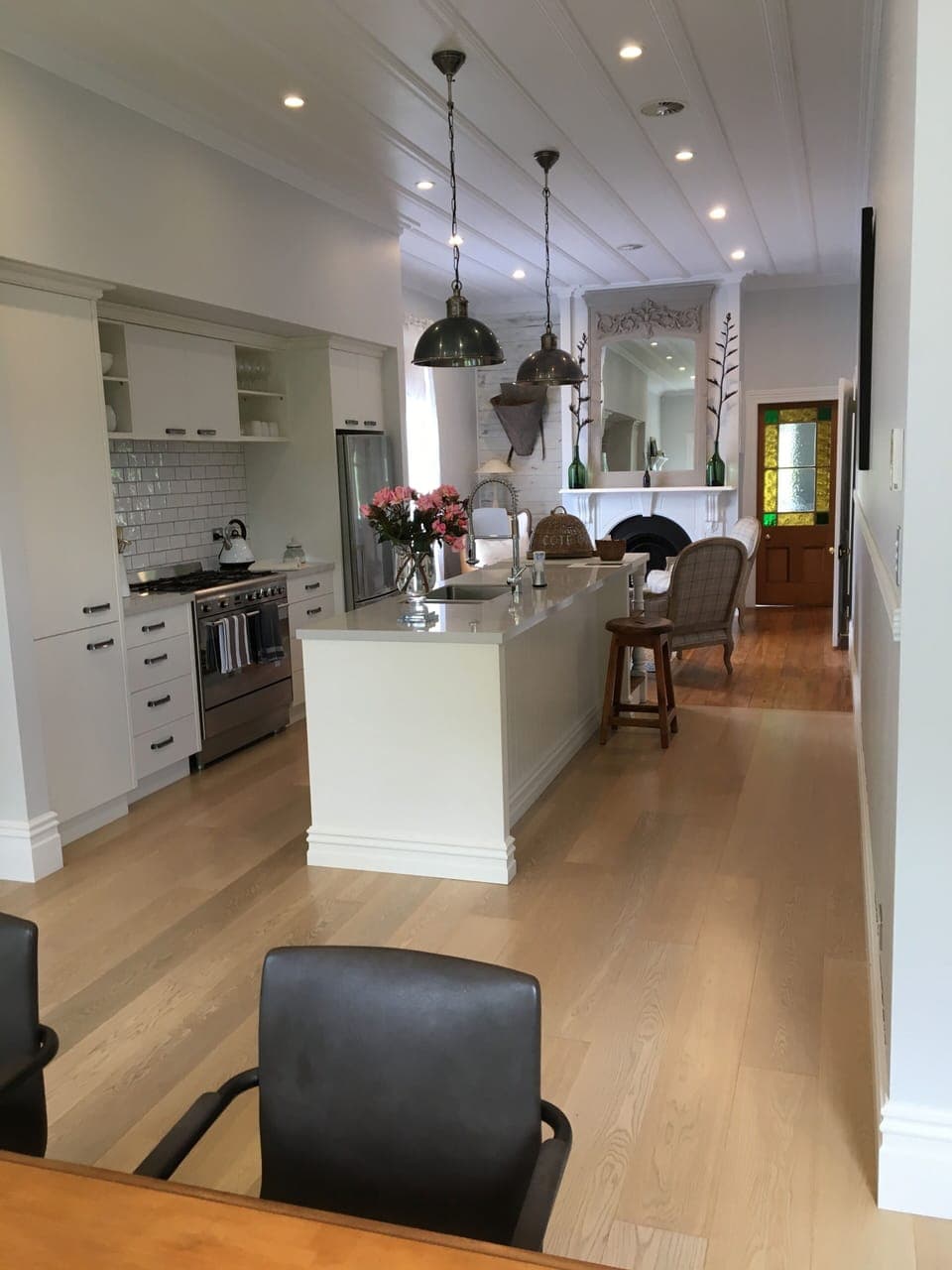 View from the dining area back to kitchen and sitting room.  