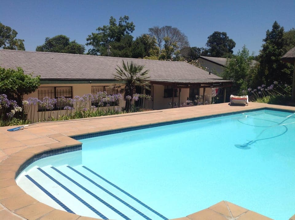 Pool at the rear of the house in very private garden 