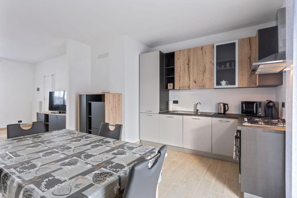 Apartment, 3 Bedrooms | Private kitchen | Full-size fridge, stovetop, electric kettle, cookware/dishes/utensils