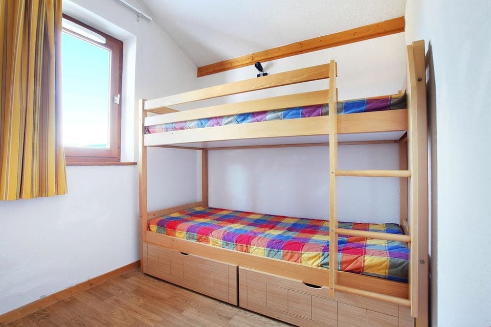 Drift to sleep in the bunk bed in the second bedroom.