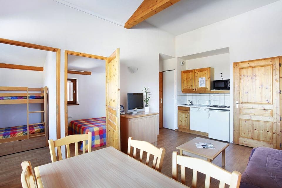 There's a Double bed in the first bedroom and Bunks in the second bedroom.