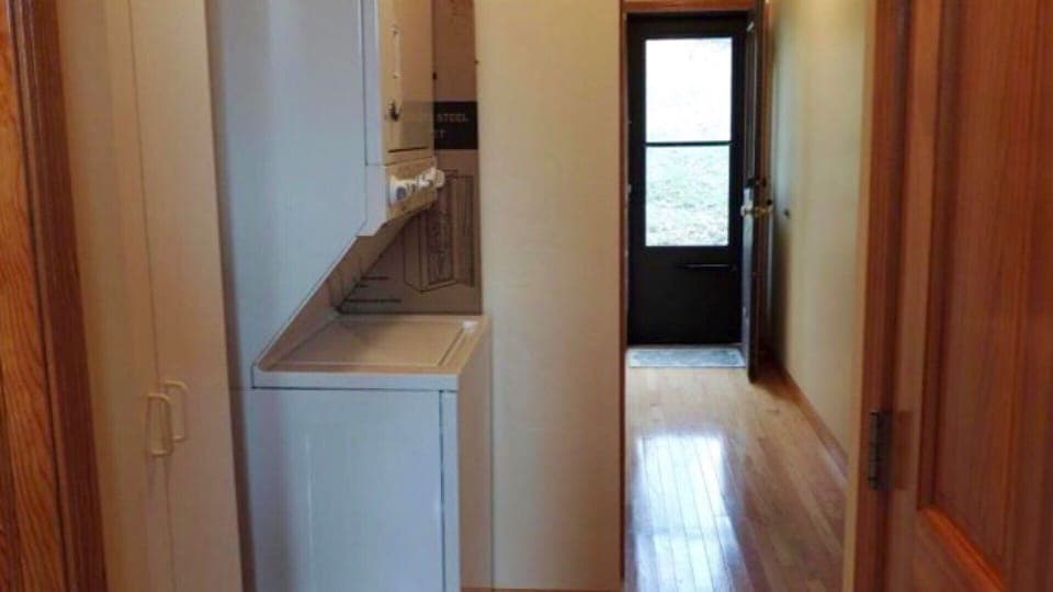 First floor easy access to stackable washer and dryer for guests
