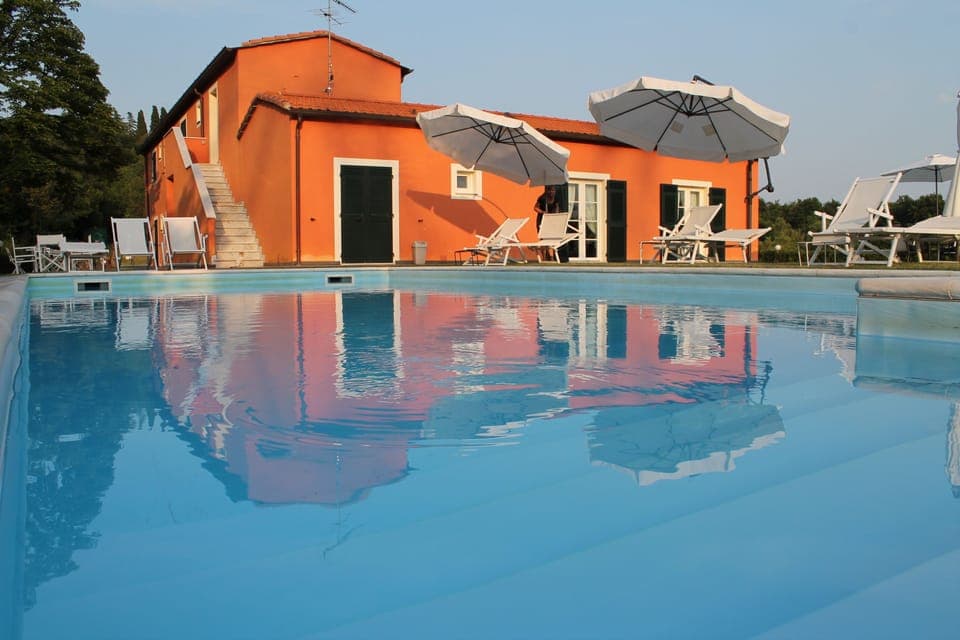 Outdoor pool, pool umbrellas, sun loungers