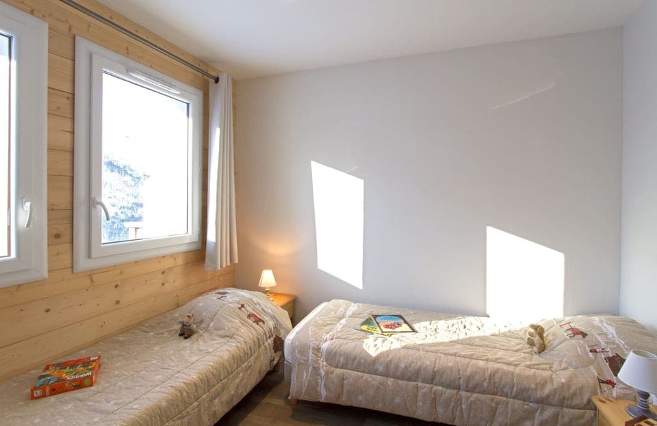 Get a good night's rest in the cozy bedroom which has 2 Single beds..