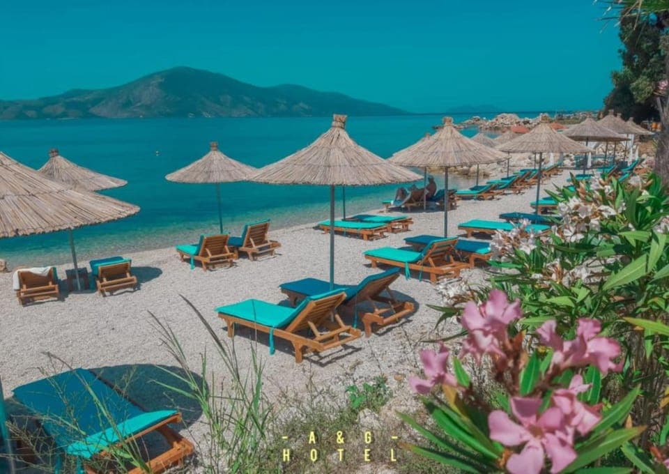 Private beach, sun loungers, beach umbrellas