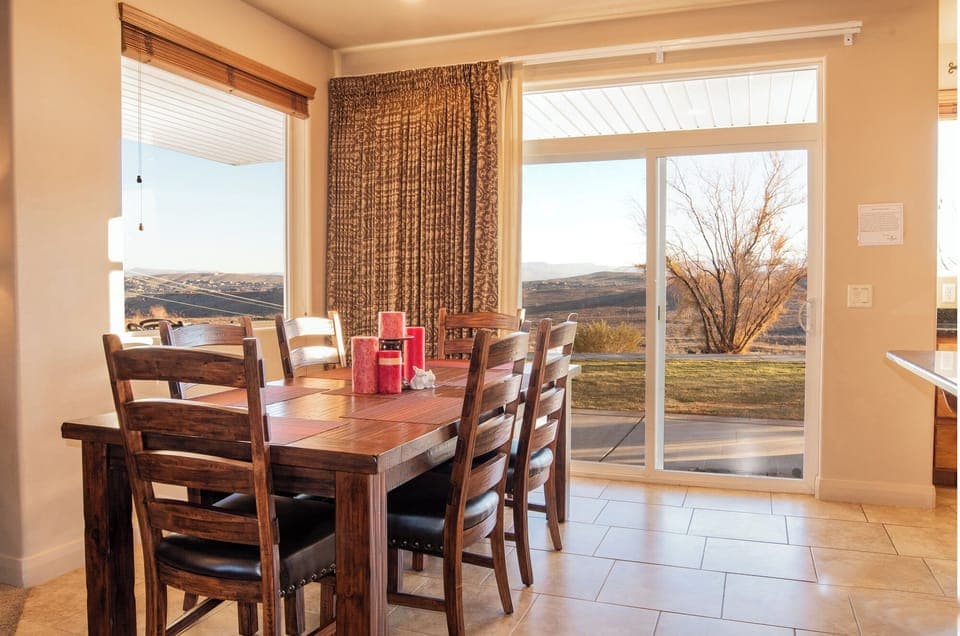 Dining table pulls out to seat 10 + 2 at counter