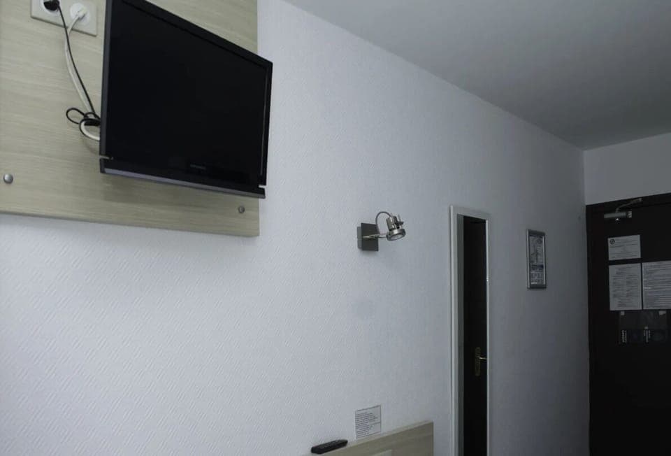 Desk, laptop workspace, blackout drapes, soundproofing