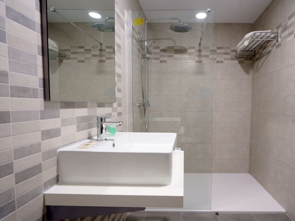 Shower, free toiletries, hair dryer, towels