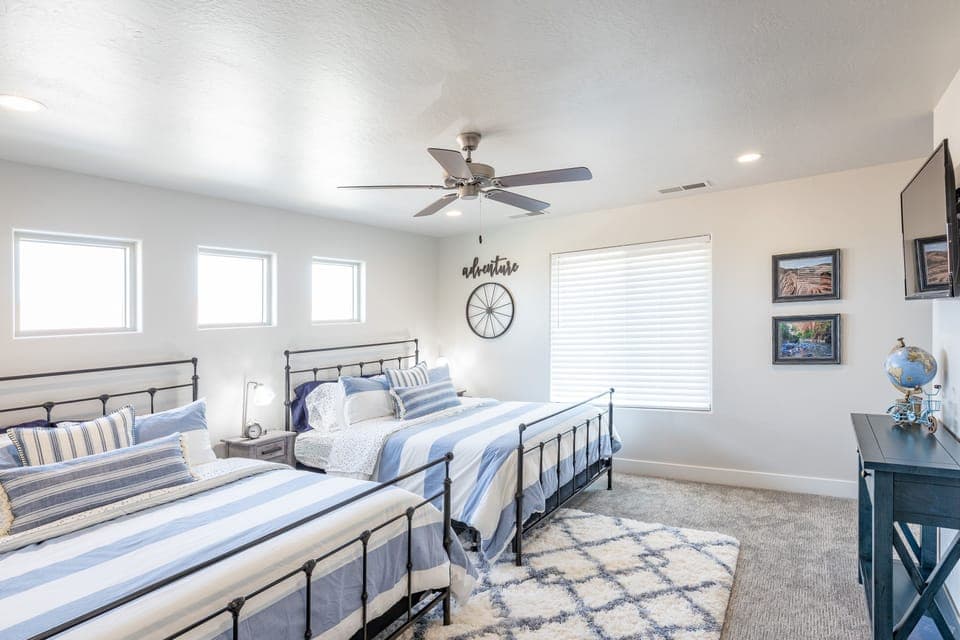 Bedroom 4 - Bedroom 4 is a large bedroom which includes two queen beds, walk-in closet and private TV.