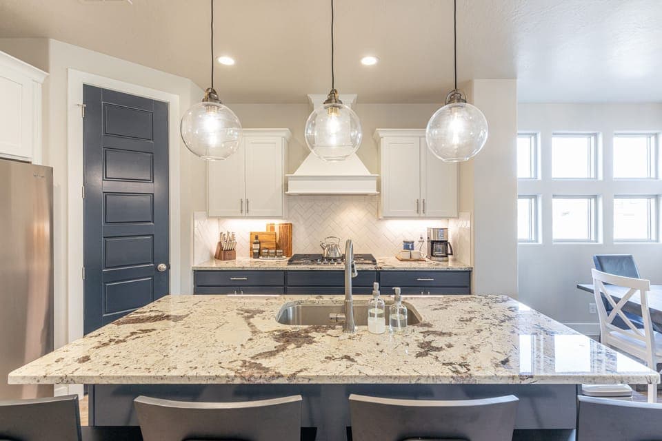 Kitchen Island - The Kitchen Island comfortably seats 4 adults and creates a great space for serving and preparing meals.