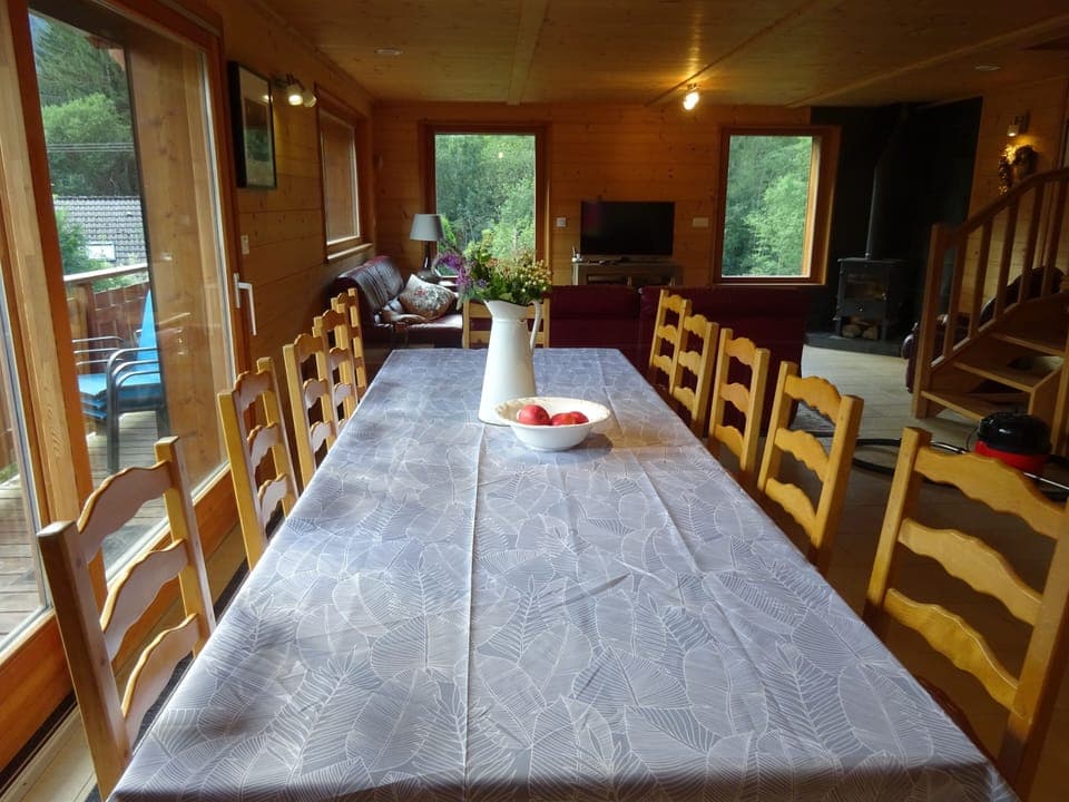 dining table seats 12 people, sliding doors to balcony