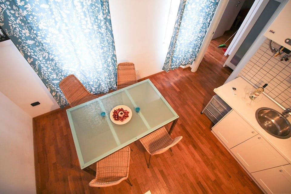 Marina di Grosseto - Lavanda Apartment - View of the dining room with kitchenette from the staircase leading to the private terrace
