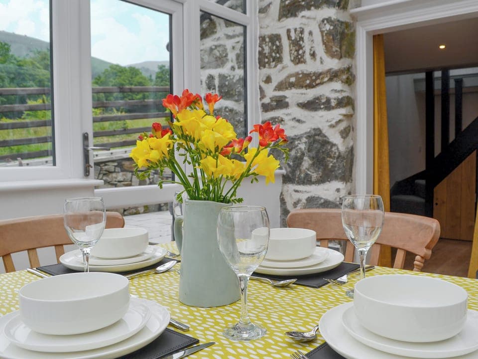 Delightful sun room with dining area | Ysgoldy Salem - Cewydd Cottages, Cwm-Cewydd, near Machynlleth