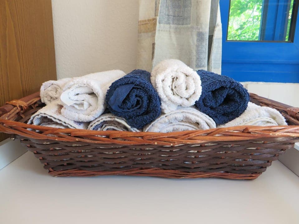 Shower, free toiletries, hair dryer, slippers