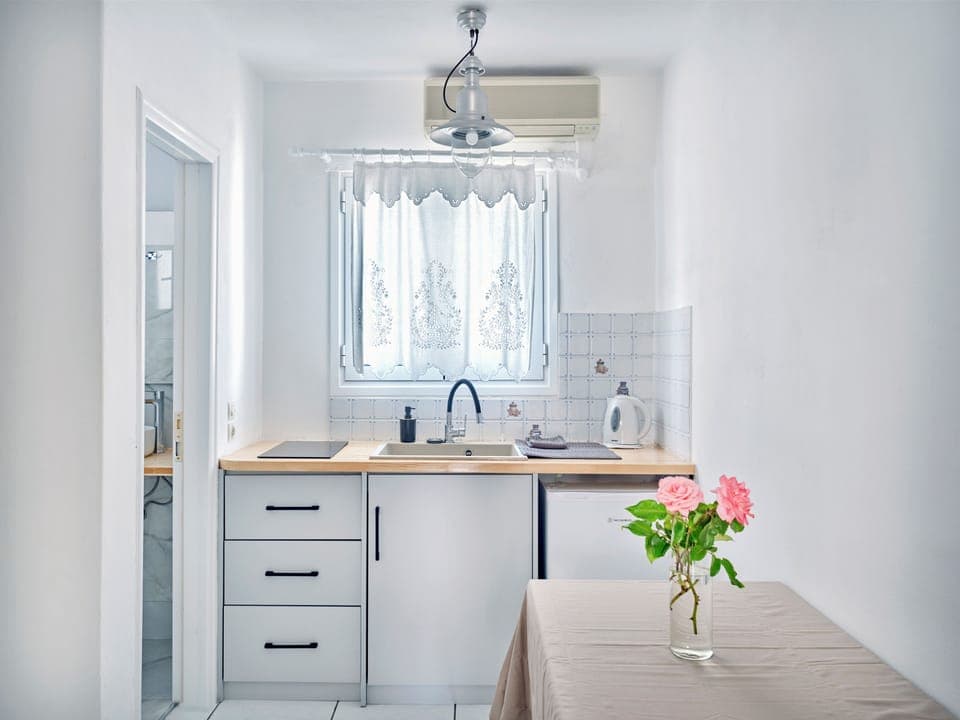 Premium Apartment, Pool View (4 Adults) | Private kitchen | Dining tables