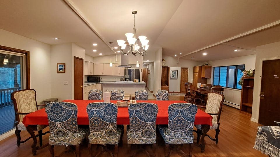 With the oak table in the background the dining room seats 18 people. 