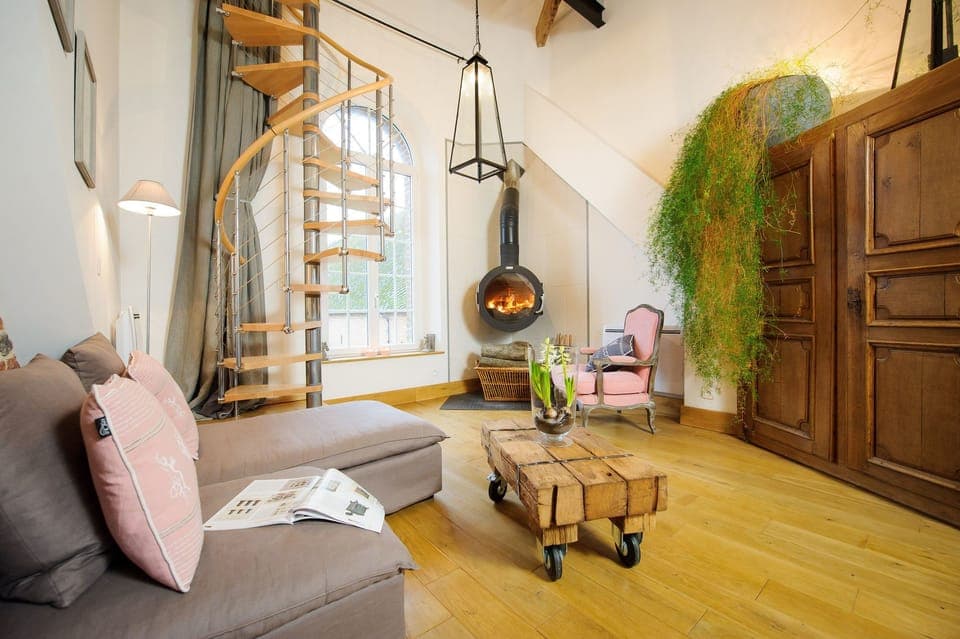 Suite (Lune de Miel Triplex spiral stairs) | Living area | Flat-screen TV