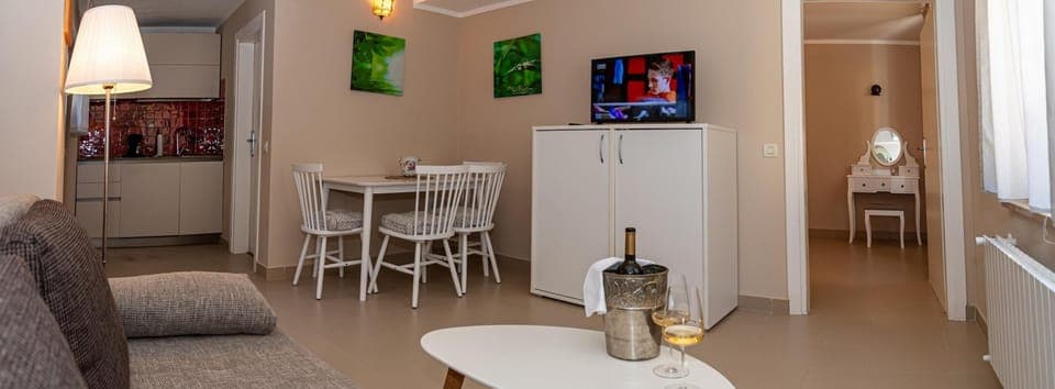 Apartment, 1 Bedroom, Ground Floor | Living area | 60-cm flat-screen TV with satellite channels